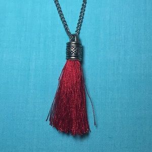 red string necklace